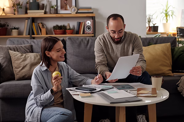 Couple reviewing mortgage income guidelines for eligibility